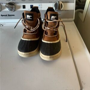 Sorel Tan and Black Boots